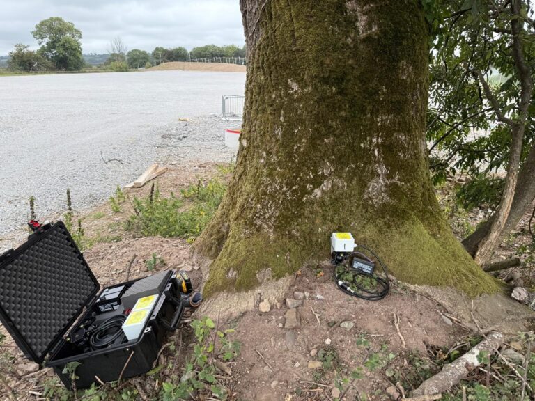 Inclinometer installed at the base of a tree during DynaRoot root stability testing on a development site in Ireland